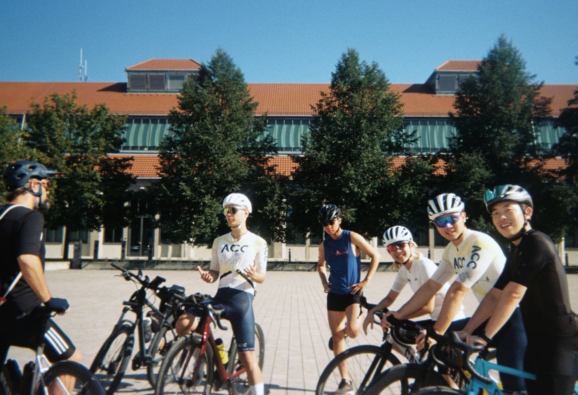 Riders gathered at the meeting point, smiling as the route is explained